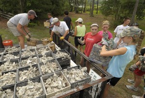 UNCW volunteers – including Oceans 17 summer camp, undergraduates, alumni and researchers – have worked with St. James residents.
