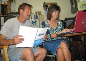 Rusty and April Taylor from Harkers Island work on their business plan after taking the workshops online. 