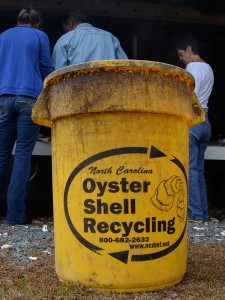 Oyster shell recycling bins are placed at the site of the roast.