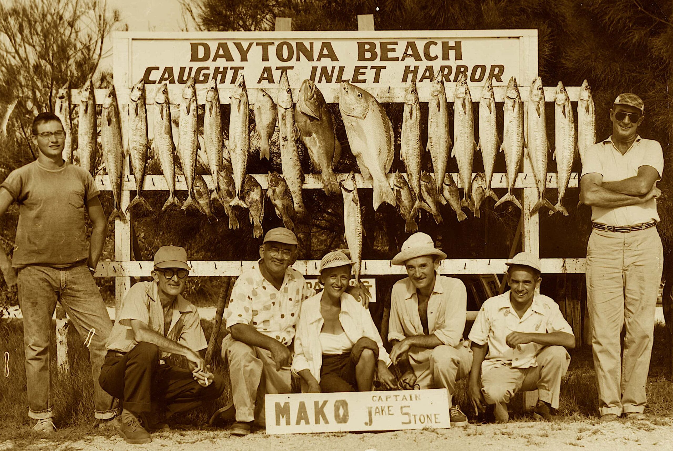 image: fishers with their catches, Daytona Beach, 1952.