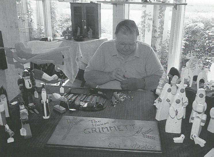 Willie Jimerson with hand-carved items