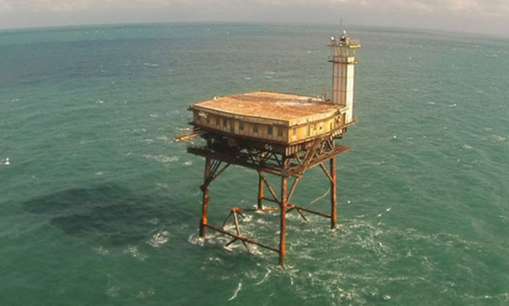 Diamond Shoals Light Tower in the ocean.