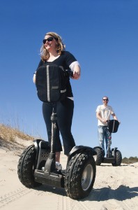 Visitors enjoy segway tours of the beach.