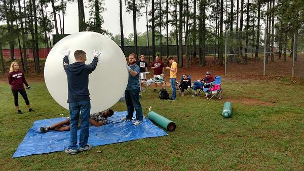 students test balloon launch