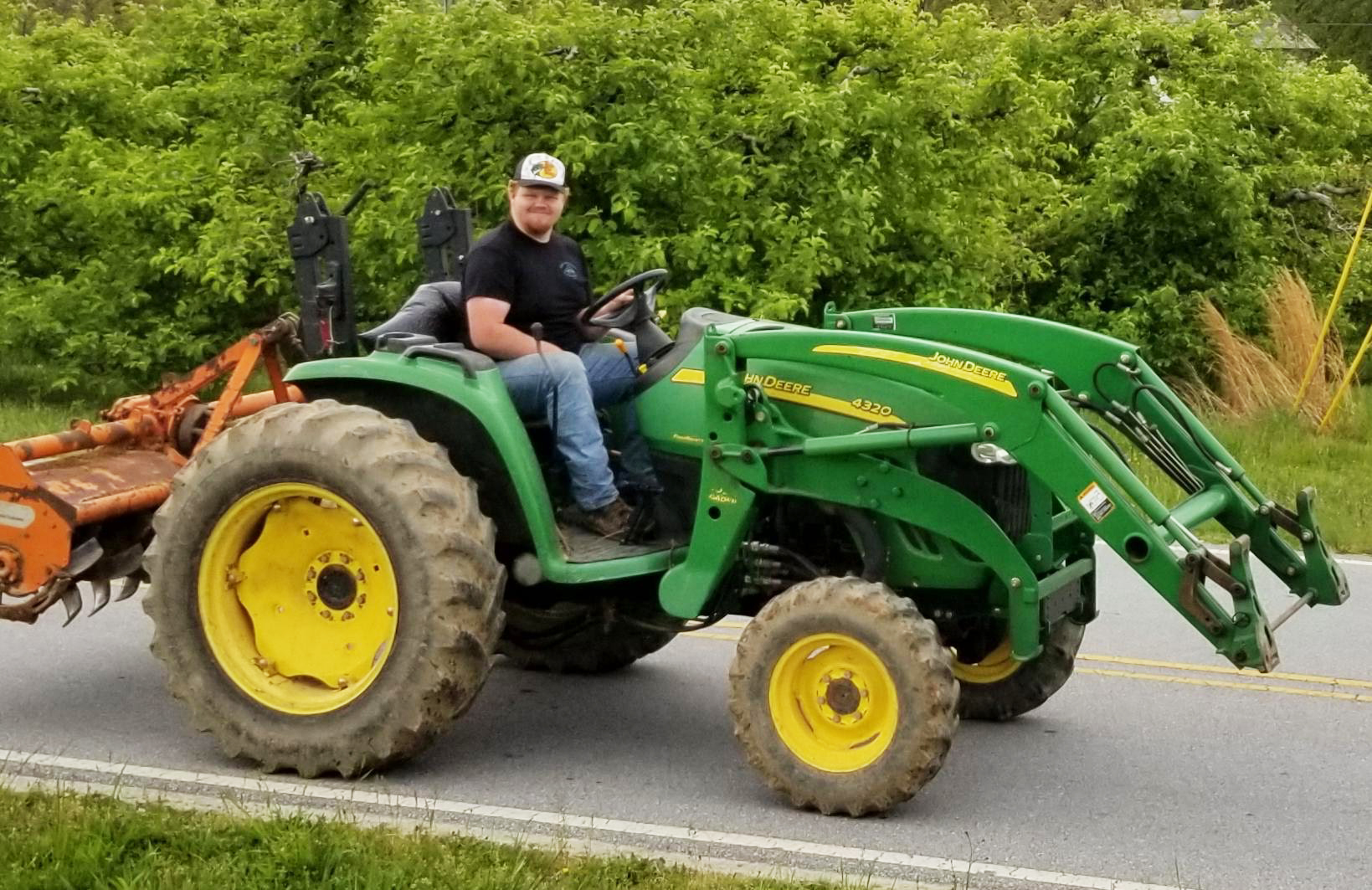 Aaron Corn on a tractor