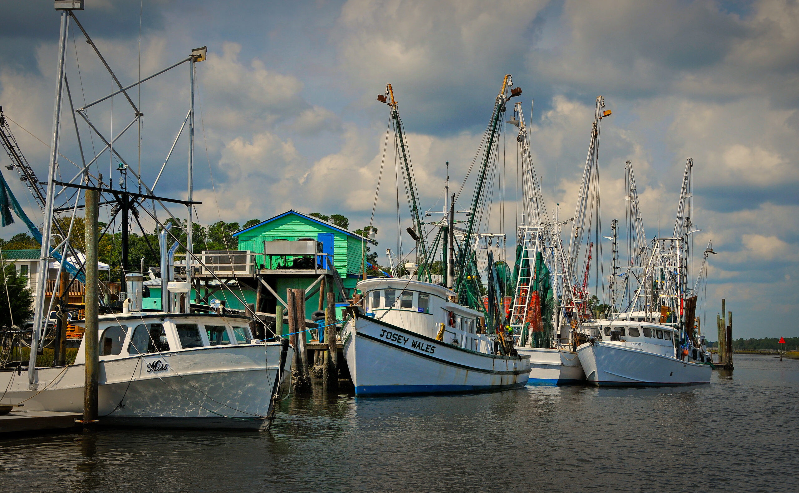 image: commercial fishing boats.