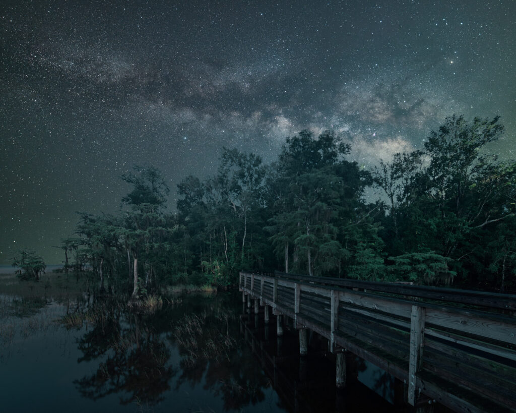 image: starry night over water.