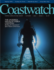 cover of the 2024 issue of Coastwatch: Fabien Cousteau underwater in diving gear.