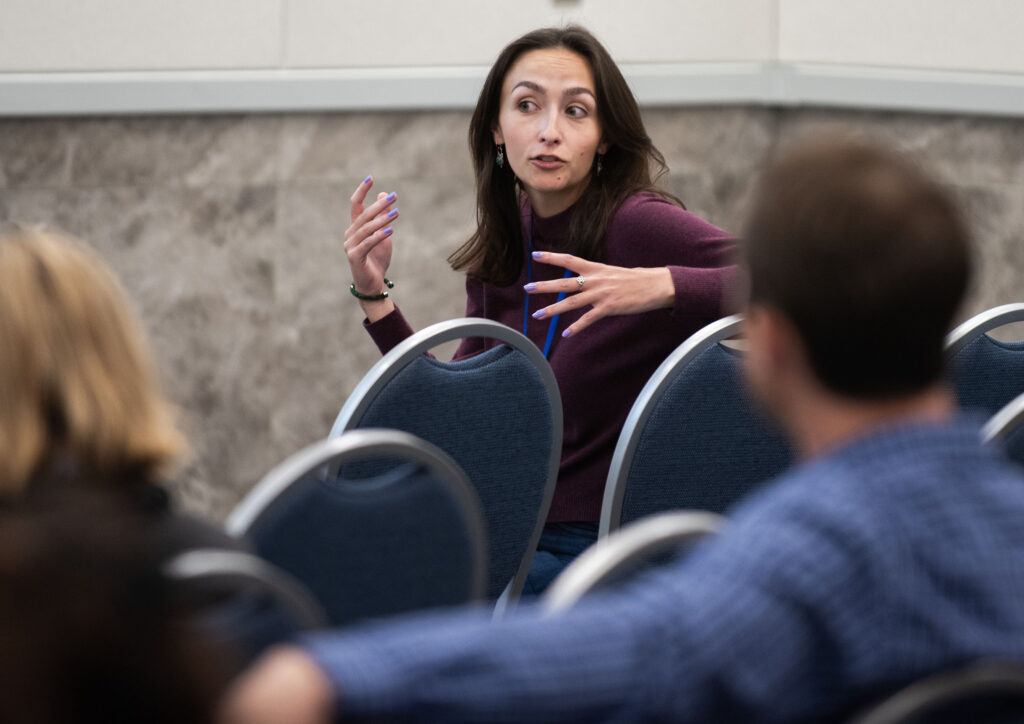 image: Participants ask questions during the afternoon research presentations at the 2024 North Carolina Coastal Conference. The event, hosted by North Carolina Sea Grant, was held Nov. 13-14, 2024 at the Riverfront Convention Center in New Bern, N.C. (Photo by Jamie Moncrief).