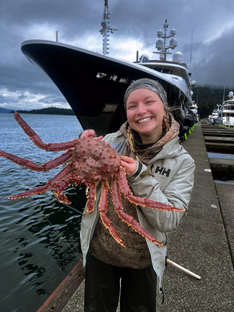 image: Hannah Bogdan holding a crab.