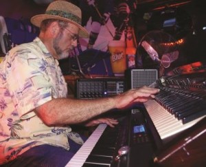 Voiland plays two keyboards at the same time. 