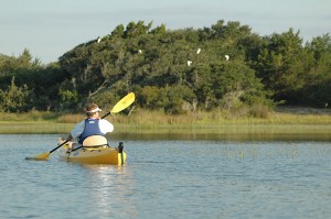 Brian Efland paddles in a kayak.