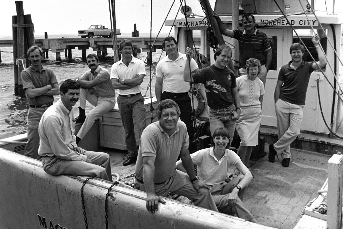Sea Grant extension staff from the mid-80s on a boat