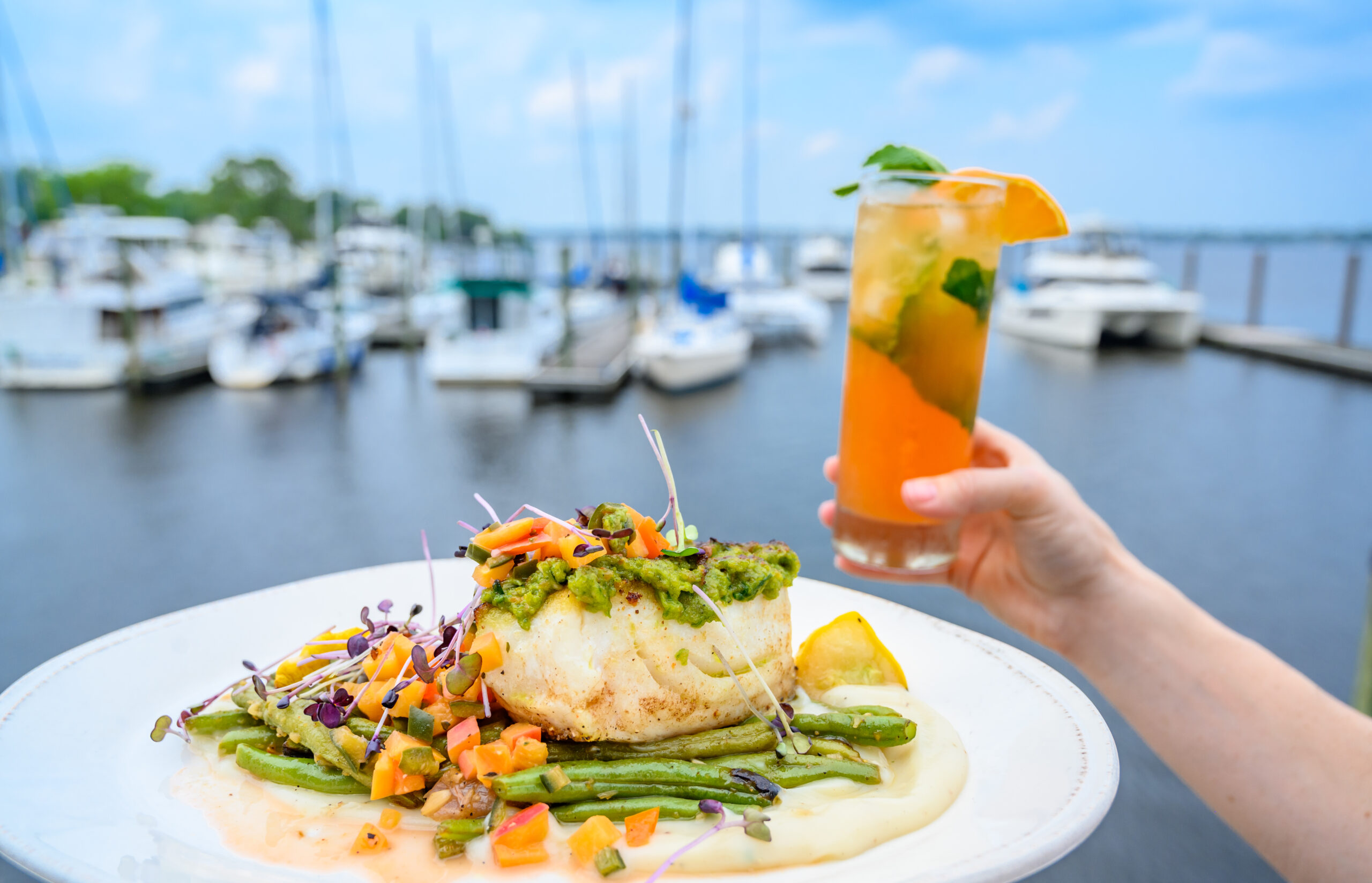 Fresh Catch and a "Rossalie" craft cocktail at Persimmons restaurant in New Bern. Credit: VisitNC.com