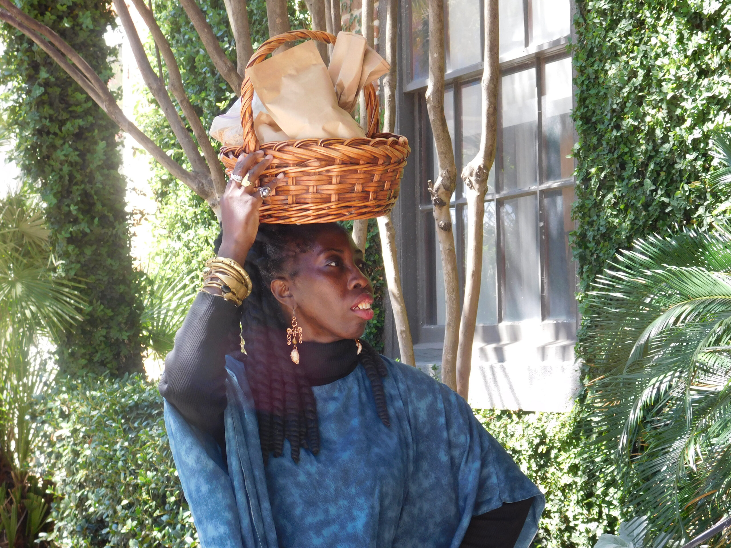 Queen Quet carries heirloom seeds necessary to sustain the community’s traditional agrarian practices. Credit: Gullah/Geechee Sea Island Coalition Alkebulan Archive.
