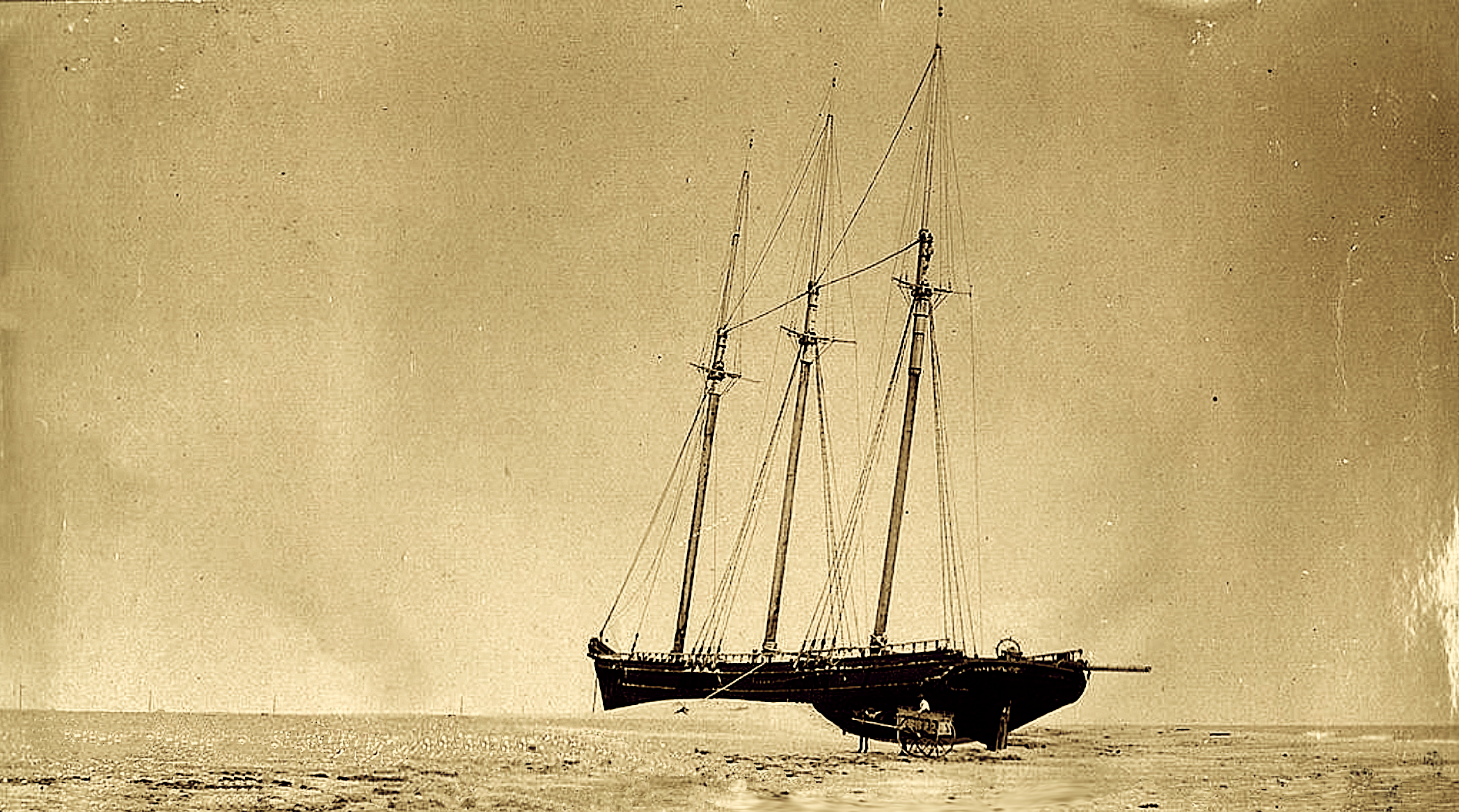 The E.S. Newman (here, aground after the hurricane passed), carried nine passengers. The Pea Island Surfmen reportedly rescued the captain's 3-year-old son first, then the captain's wife and the six crew members one by one, before finally bringing the captain to shore.