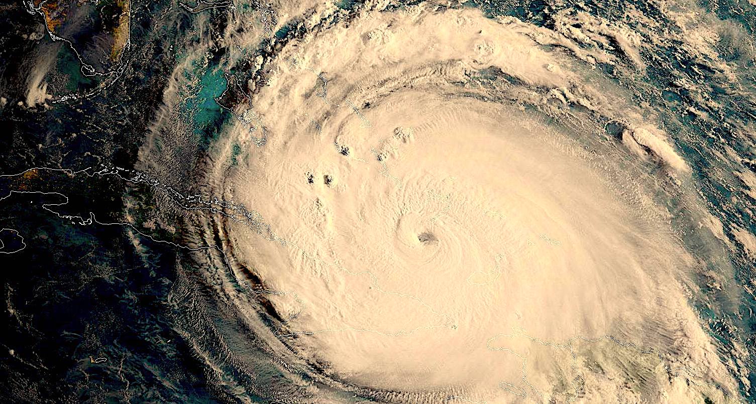 image: satellite photo of a hurricane. When identifying fish species most sensitive to hurricanes and storms, the news media only paints a partial picture. Credit: NOAA/NASA.