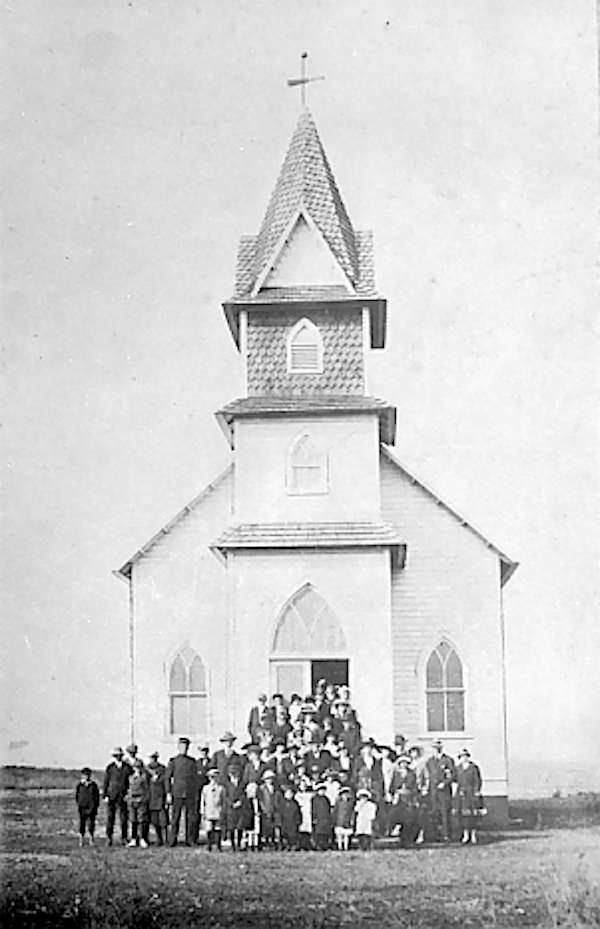 image: Portsmouth’s Methodist church, mid-20th century with people standing out front.