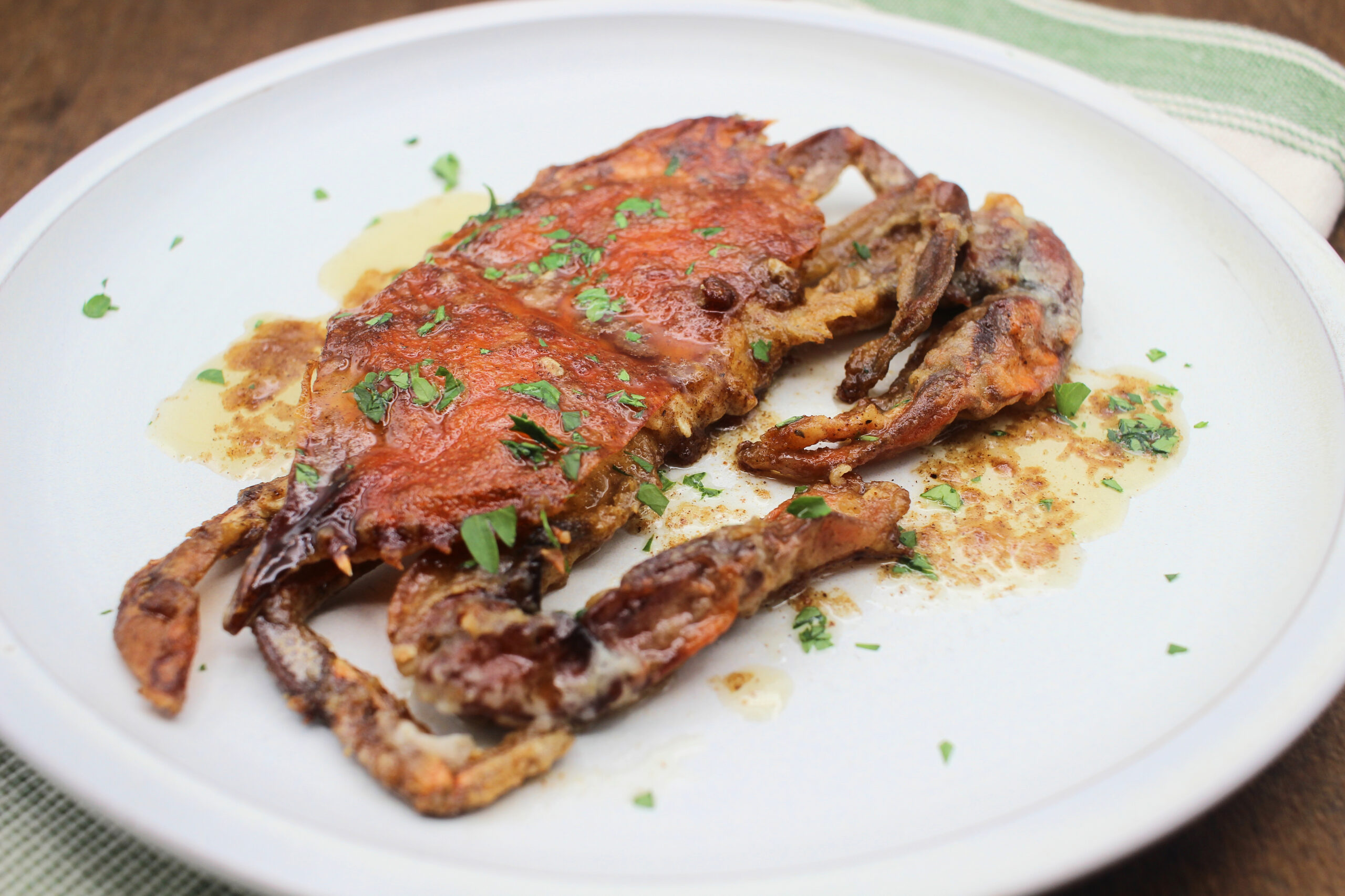 image: Soft-Shell Crabs on a plate with Garlic Sauce. 