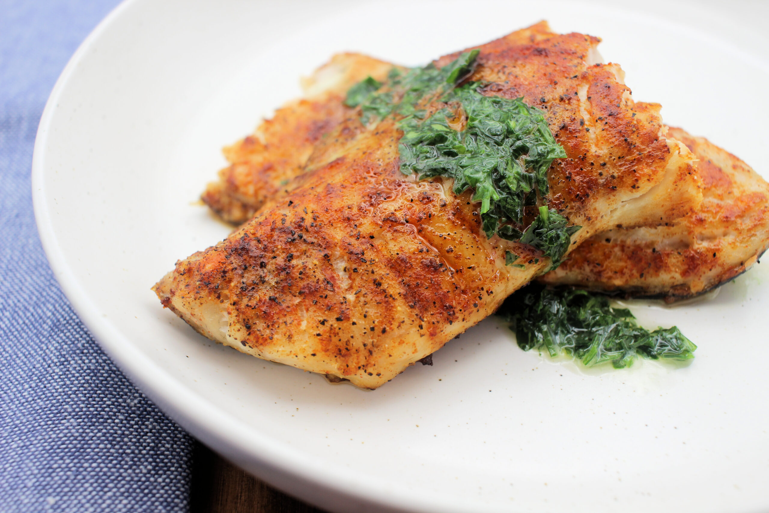 image: Baked Spotted Trout with Parsley Butter.