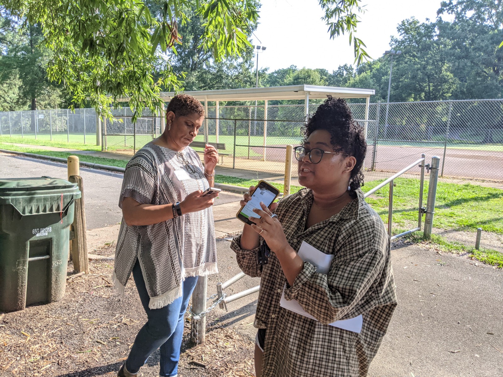 Alyanna Wilson instructs participants in how to use the i-naturalist app at a “Trees and You” workshop at Biltmore Hills Park. Data collected by participants was used to create a tree guide for Biltmore Hills Park.
