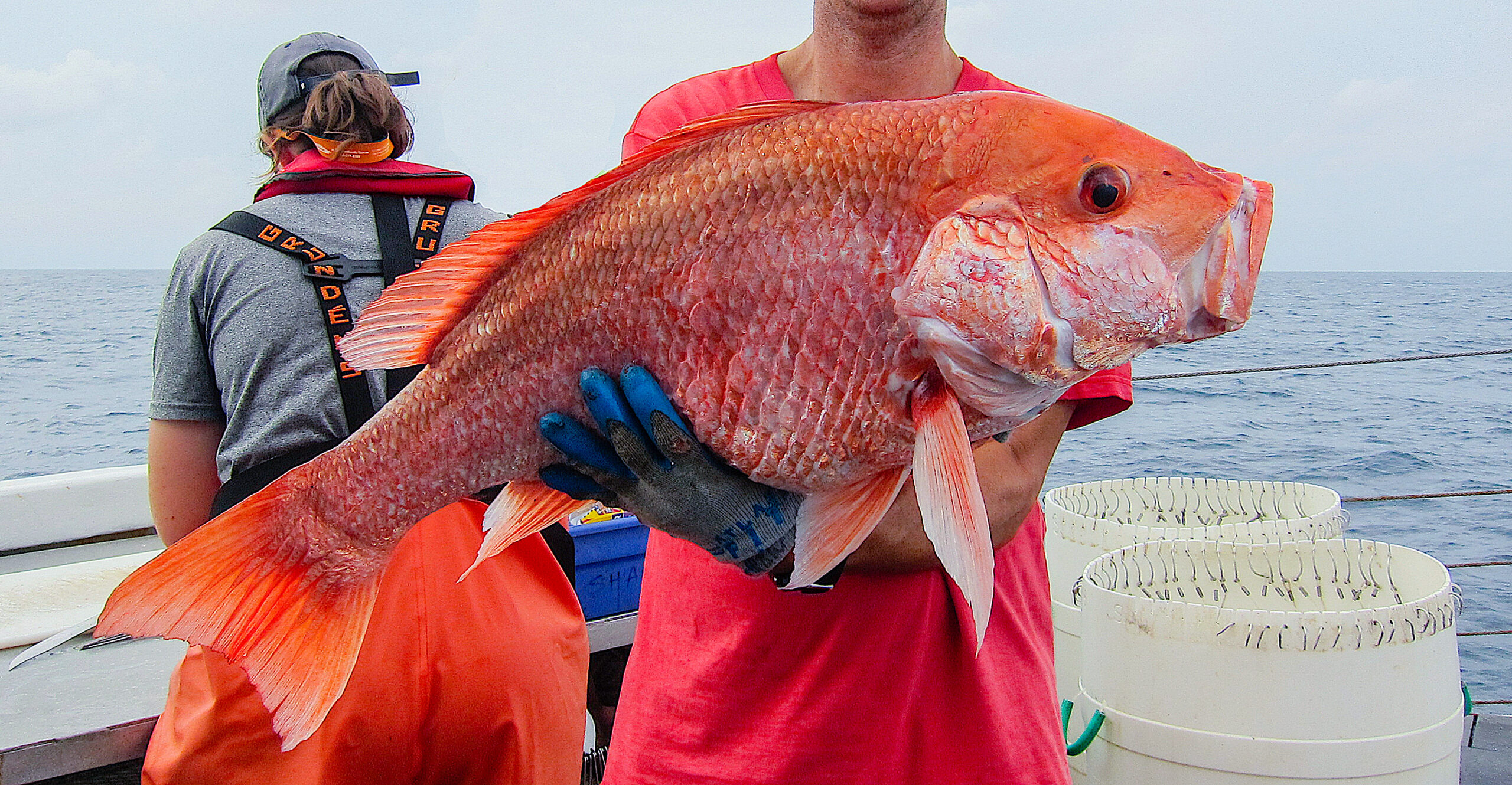 image: Jeff Miller holds a red snapper.