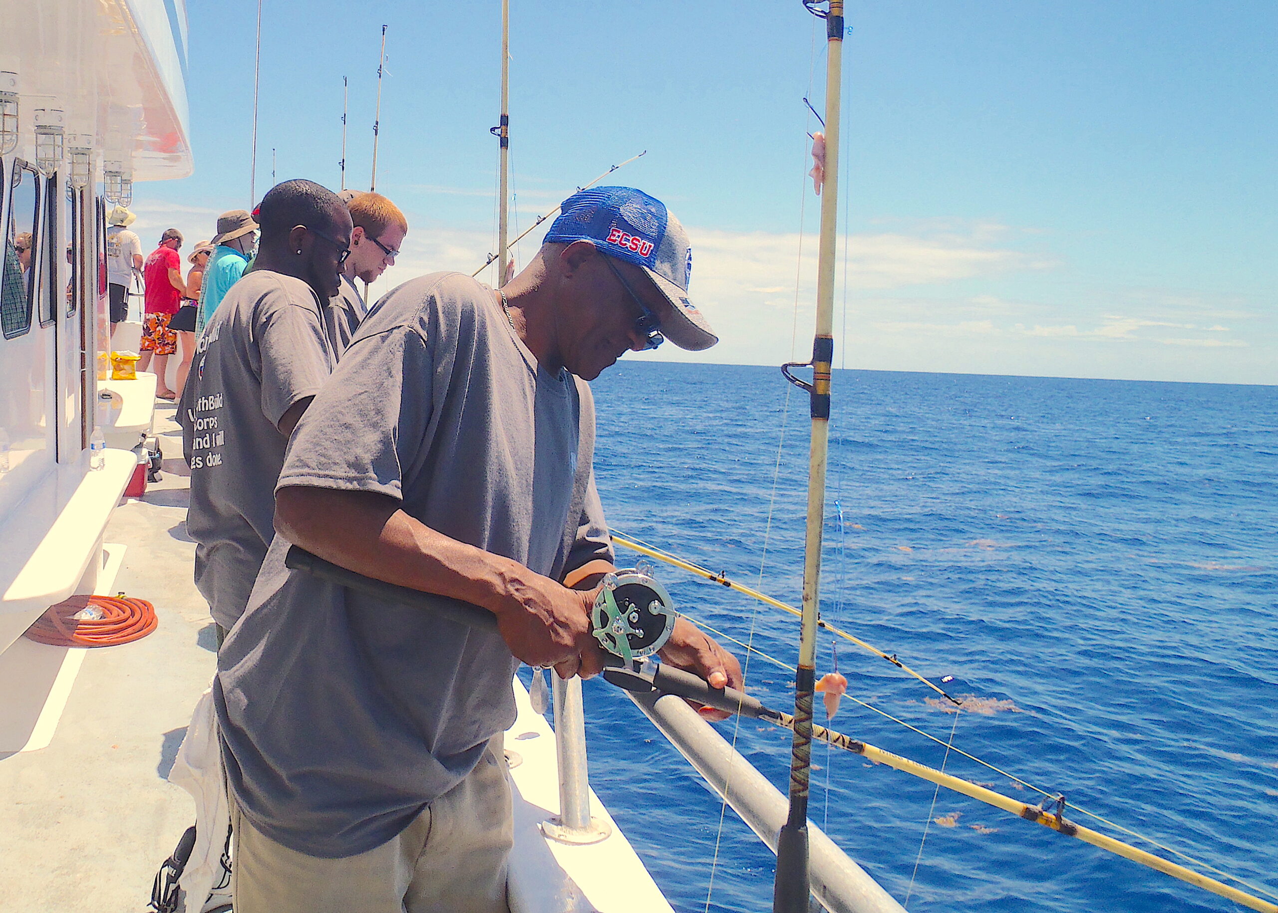 image: men fishing.