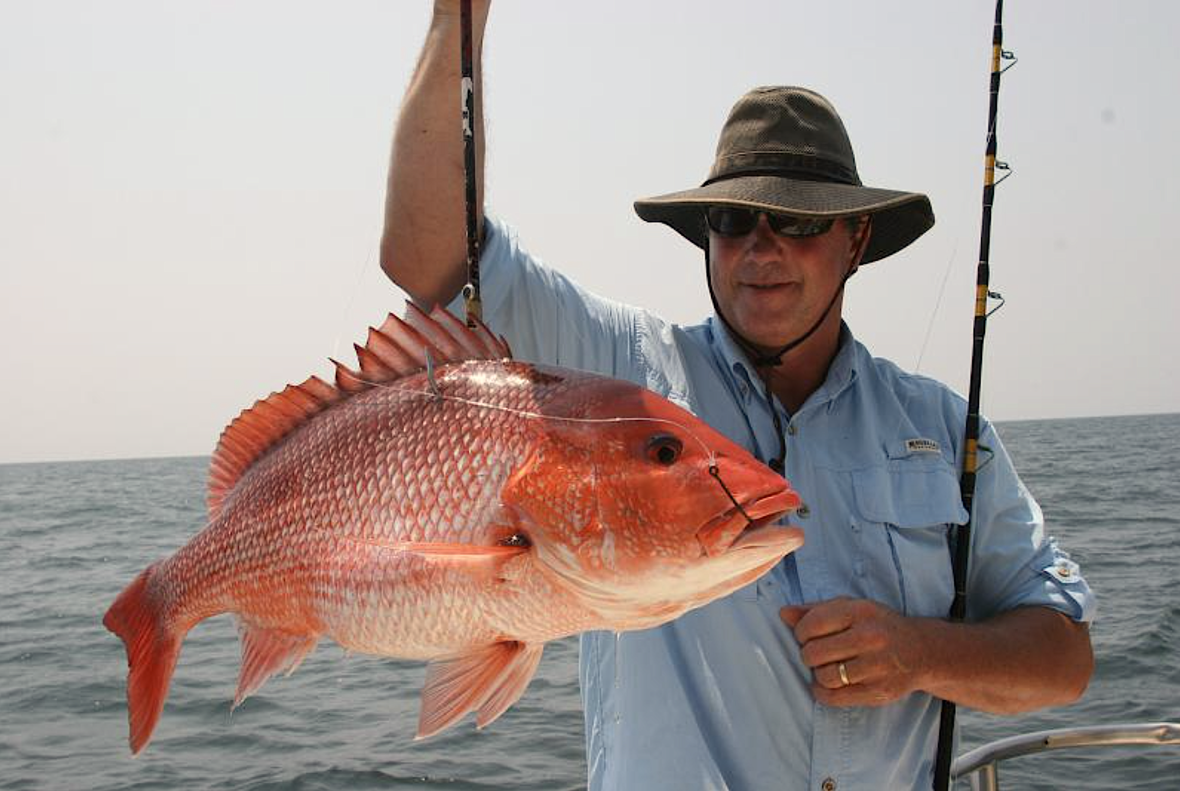 image: an angler with a red snapper.