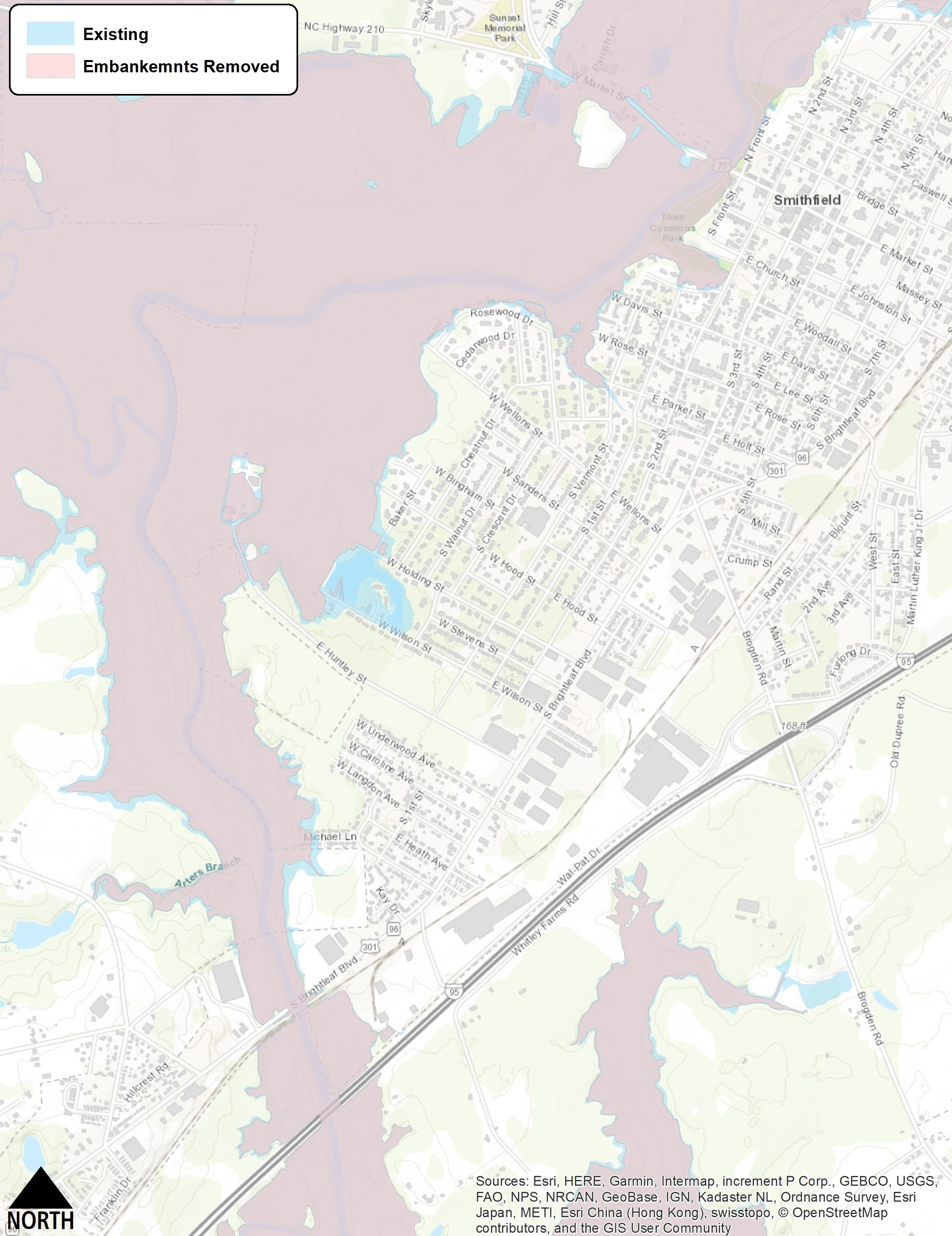 Figure 3: Flood extents for a Hurricane Matthew scale event comparing the existing condition (blue) to the reduced floodplain extent (pink) that can be achieved by modifying all three bridges (U.S. 301, railroad and I-95). The 1.4-foot reduction in water surface results in only a minor change in the areal extent of flooding due to the shape of the floodplain and the surrounding terrain