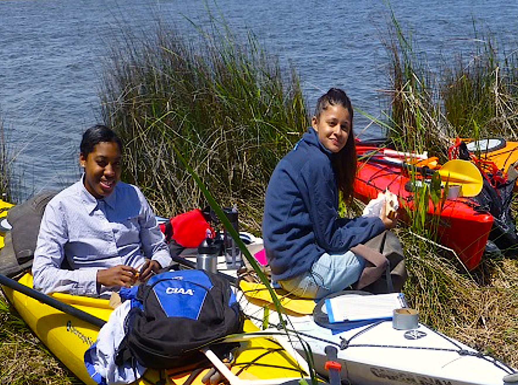 Chowan students take a lunch break at Pine Island Sanctuary during a Community Collaborative Research Grant project a few years ago. Photo courtesy Chowan University Biology Department.