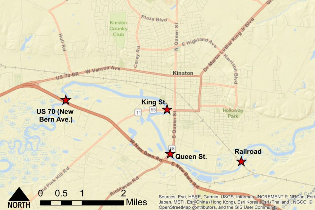 Map of Kinston indicating the location for three road bridges along U.S. 70, King St, Queen Street, as well as a railroad bridge southeast of town, that were modeled to evaluate changes in upstream flooding.