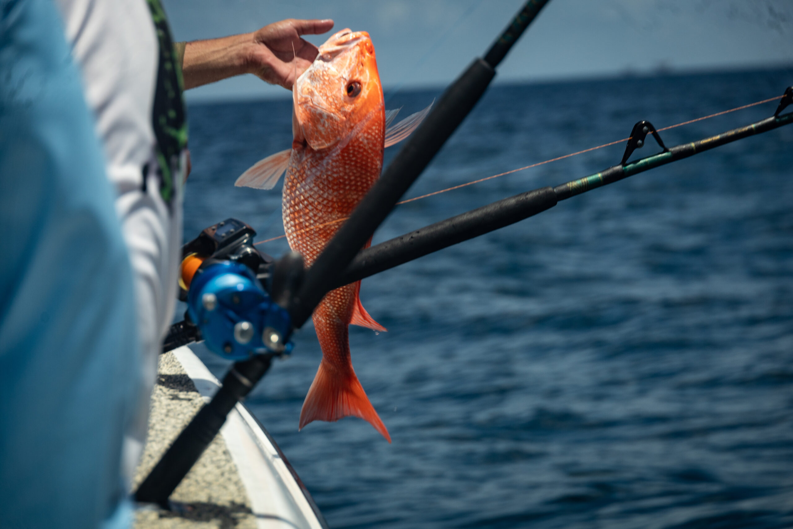 image: angler with his catch.